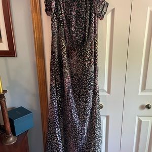 Brand new off the shoulder black with flowers. Under garment slip attached